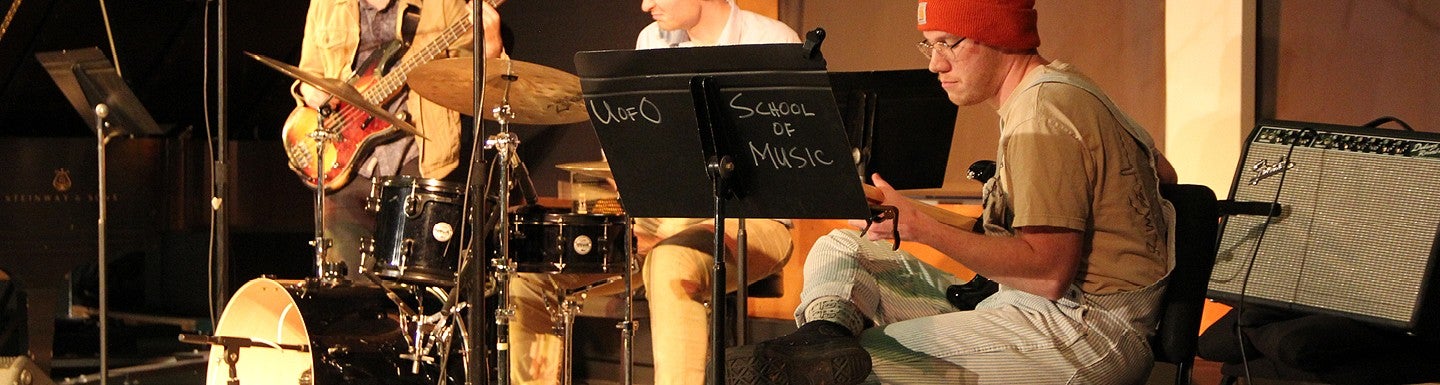 student playing guitar