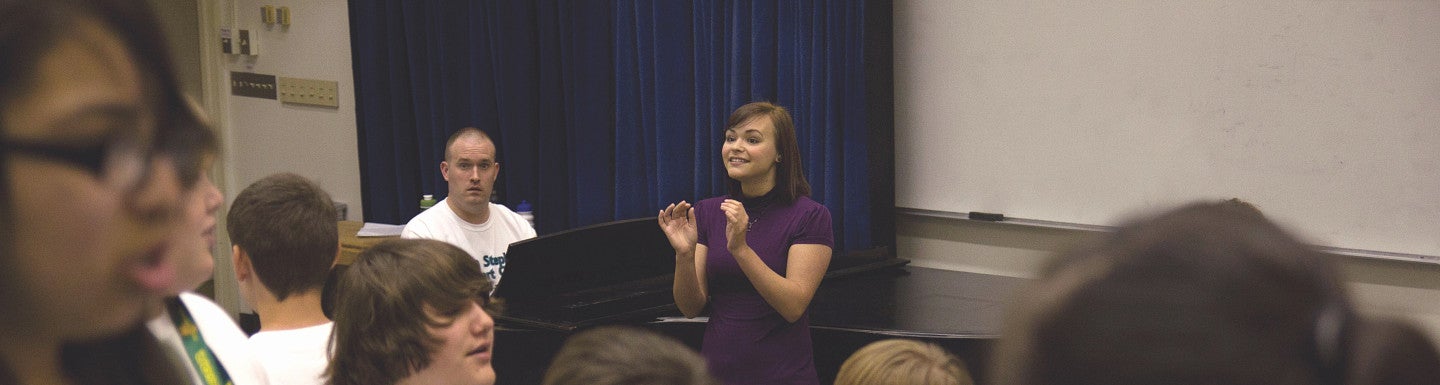 Conductor looking at childrens choir